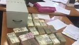 В Киеве ликвидирована масштабная схема уклонения от уплаты налогов: изъято около 7,3 млн грн наличными в различных валютах. ФОТОрепортаж