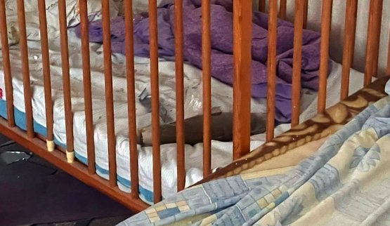 Attack on Kherson: ammunition from Russian drone landed in cot where two-year-old boy was sleeping. Child miraculously survived. PHOTO
