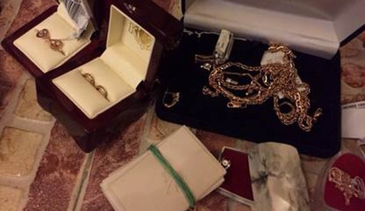 About $500,000 and valuables seized from the detained prosecutor's office officials. PHOTOS