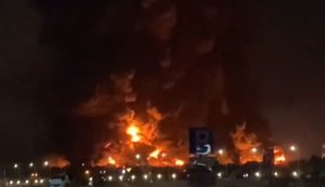 Russian man films nighttime drone attack on Wildberries warehouse in Krasnodar: "It’s flying, can you hear it? Those are missiles flying". VIDEO