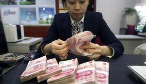 У Китаї почали боротися з "розкішшю": премії банкірам урізали на третину