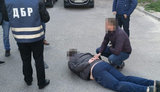 На Дніпропетровщині прокурора затримали на хабарі 7 тис. дол. за закриття справи, - ДБР. ФОТО