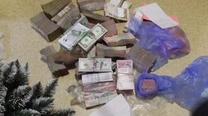 Співробітники харківської поліції пограбували бізнесмена на Луганщині, - СБУ. ФОТО