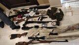 Співробітникам поліції та директору магазину зброї на Київщині повідомлено про підозру у видачі незаконних дозволів на зброю, - ДБР. ФОТОрепортаж