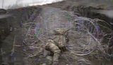 Бойцы 414 бригады ликвидировали оккупанта, который застрял в колючей проволоке