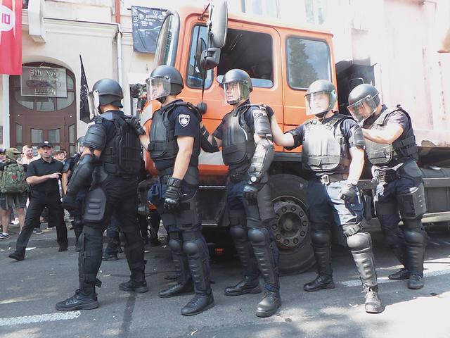 Protesters clash with police near Rada building 16