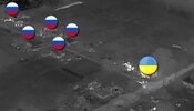 танк стреляет в упор по оккупантам