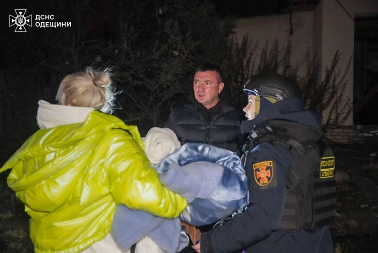 Rescuers help people at the arrival site in Odesa