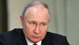 путін