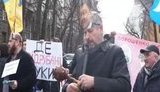 "Порошенко гарант кривавих грошей", - активісти "Руху нових сил" прийшли на Банкову з "доларами" і свинячими кінцівками. ВІДЕО+ФОТОрепортаж