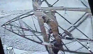 Drone shot down occupying communications officer who was trying to install equipment on high-voltage power pole. VIDEO