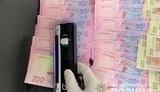 Заступника голови ОТГ в Запорізькій області спіймали на хабарі 1 млн грн, - поліція. ФОТОрепортаж