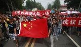 В Китае массовые антияпонские акции обернулись погромами: громили японские магазины и машины. ФОТОрепортаж