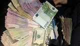 Податківці ліквідували в Києві конвертаційний центр з оборотом 200 млн грн. ФОТОрепортаж