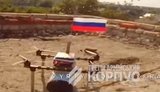 Українські воїни знищили ворожого дрона-прапороносця, який сидів на даху будівлі і "махав" триколором. ВIДЕО