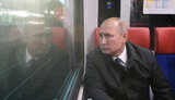 путін