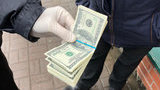 Експоліцейський і його родич відповідатимуть у суді за вимагання $4 тис. у студентів у Львові, - ДБР
