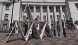 Активісти під Радою провели акцію "Картковий будиночок Путіна": За сім років війни з РФ так і не ухвалено закон про військових злочинців. ВІДЕО+ФОТОрепортаж