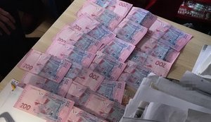 СБУ на Львівщині спіймала на гарячому хабарника з міграційної служби. ФОТО
