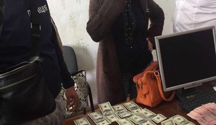 District administration chairman, official nabbed while accepting $2,000 in bribe in Odesa region. PHOTOS
