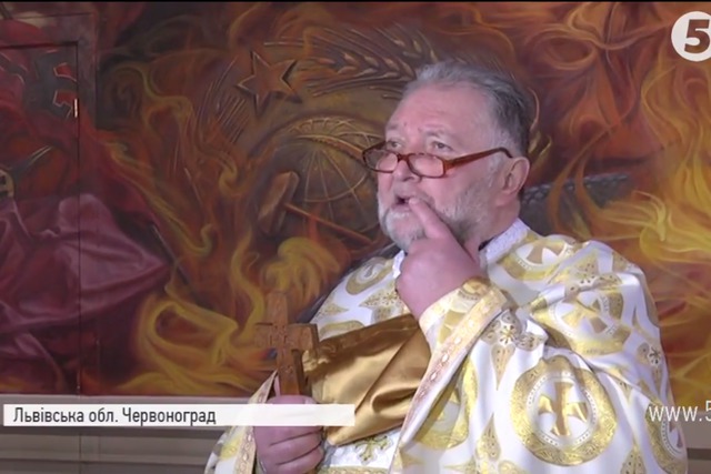 Mural depicting Putin burning in hell painted in Lviv region сhurch 03