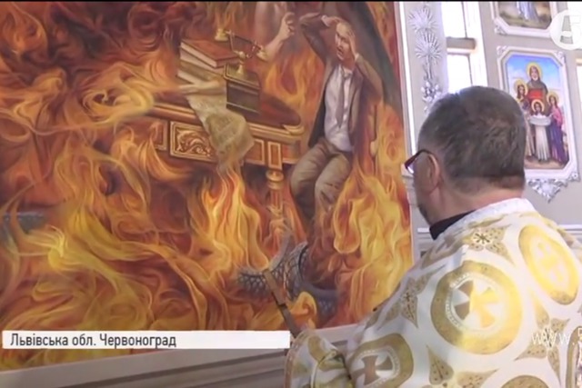 Mural depicting Putin burning in hell painted in Lviv region сhurch 01