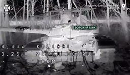 дрон атакує російський танк