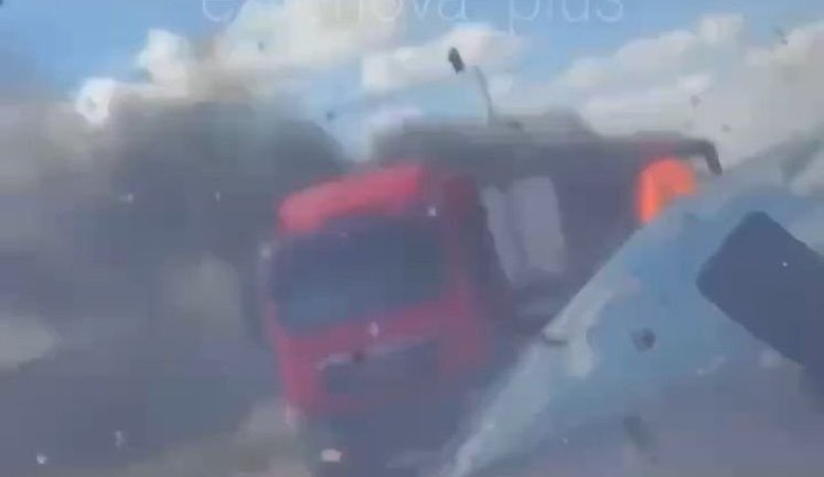 Russian lorry driver, on his way to occupied Melitopol, looks at burning lorries and is struck by drone in cab: "Man, they’re really going wild today!". VIDEO