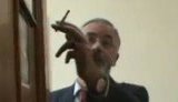 Нарушитель закона о курении Табачник сбежал от журналистов. ВИДЕО