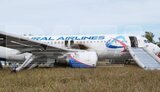 росія