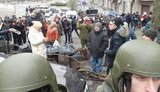 Protesters keep blocking police van with Saakashvili inside, construct barricade. PHOTOS