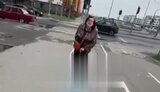 Russian woman hit migrant with cane