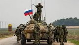 росія