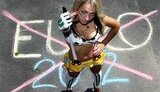 Femen устроил протест на стадионе, чтобы обратить внимание Платини на проблему проституции. ФОТОрепортаж.