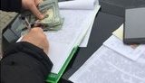 Під час спроби дати $ 2 тис. хабара оперативникам Нацполіції затримано мера одного з міст Львівщини. ФОТО
