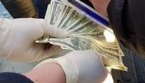 Чиновника РДА та голову сільради затримали на Буковині під час одержання 1,5 тис. дол. хабара, - СБУ. ФОТОрепортаж