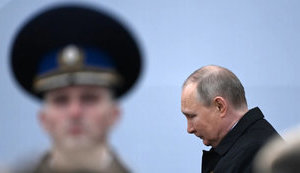 путін