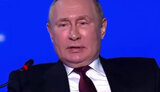 путін
