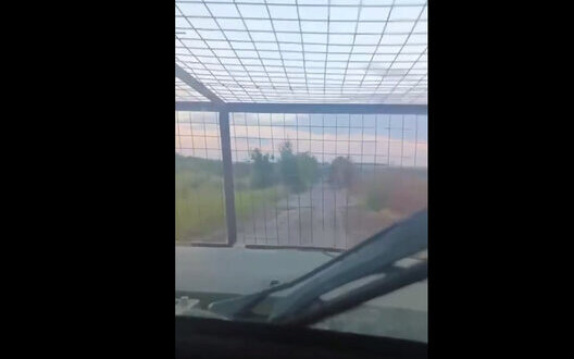 Ukrainian armoured vehicle Novator withstands enemy FPV drone attack and continues to move forward. VIDEO