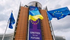 "We are with you": Ukrainian flag flies in front of European Commission headquarters in Brussels. PHOTO
