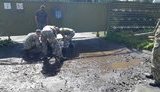 Военные в Луцке перед визитом Зеленского вычерпывали воду из луж. ВИДЕО+ФОТОрепортаж