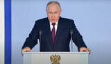 путін