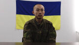 Один з полонених китайців на допиті.