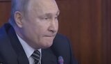 путін