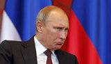 путін