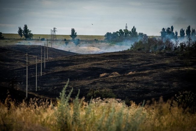 Shells detonate in occupied Donbas, fire reaches Ukrainian positions 14