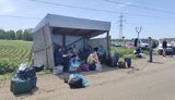 Ситуація на КПВВ: на окуповану Луганщину найманці РФ пропускають людей за списками, а на непідконтрольну Донеччину - тільки тіла померлих. ФОТОрепортаж