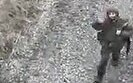 A Russian under the surveillance of a drone walks into captivity
