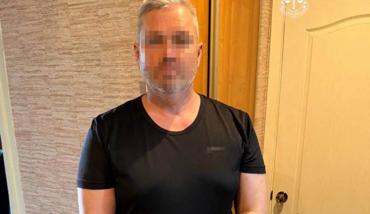Посадовця Краматорської міськради підозрюють у зберіганні дитячої порнографії та зброї, - прокуратура. ФОТО