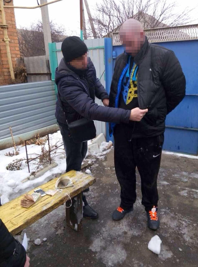 вымогатель